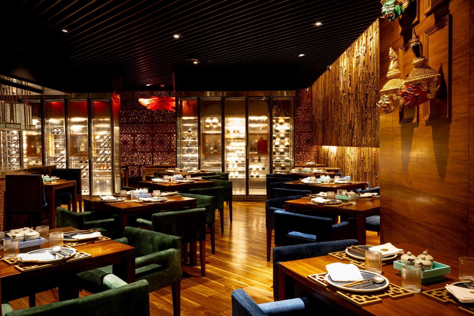 President - Ihcl Seleqtions Hotel Мумбай Екстериор снимка The interior of a restaurant in the Mandarin Oriental, Bangkok