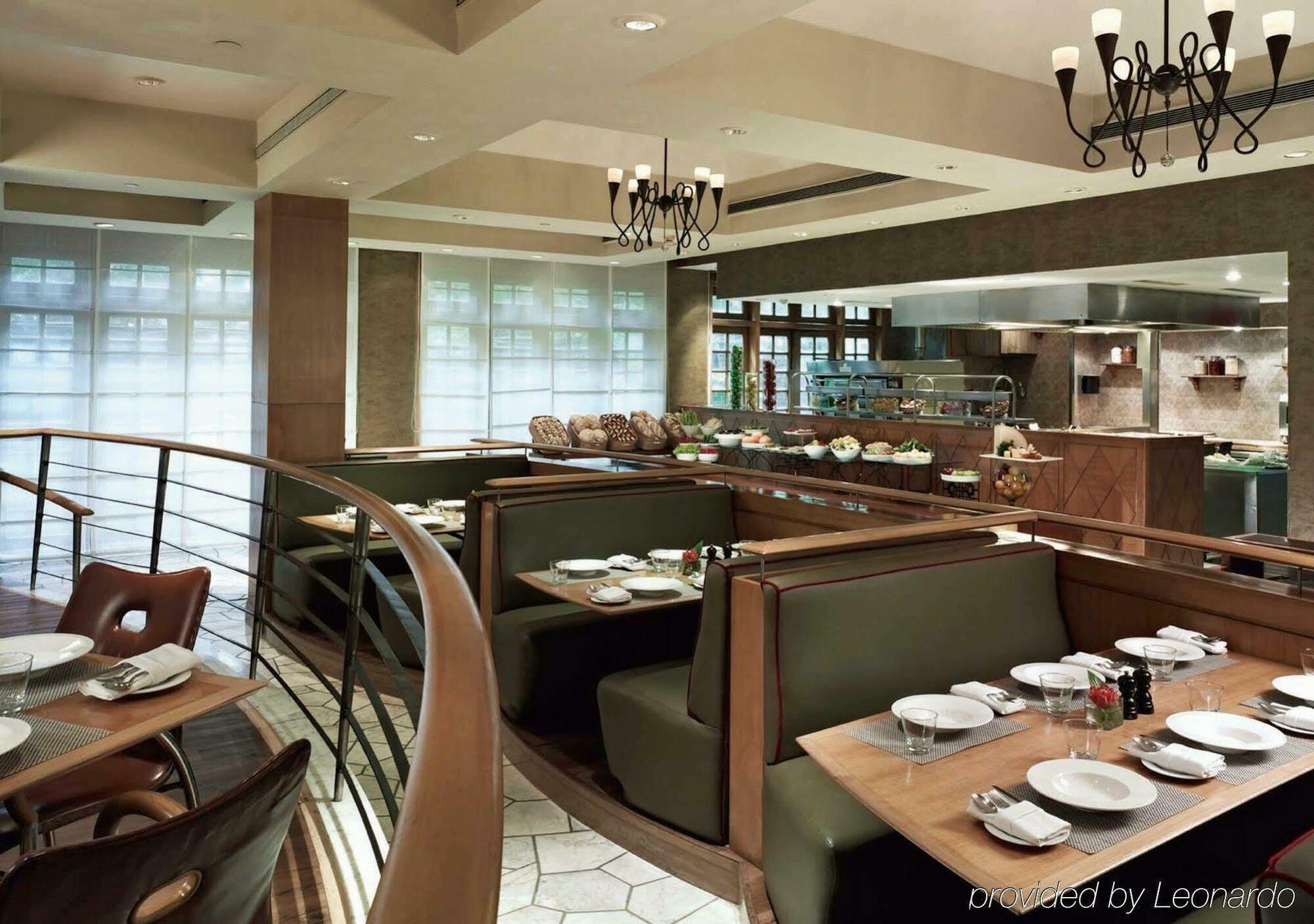 President - Ihcl Seleqtions Hotel Мумбай Екстериор снимка Interior of a restaurant